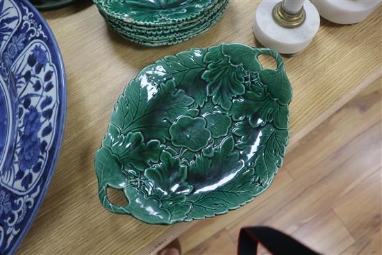 A set of green leaf plates and a Majolica mouse cheese dish and cover, height 13cm approx.